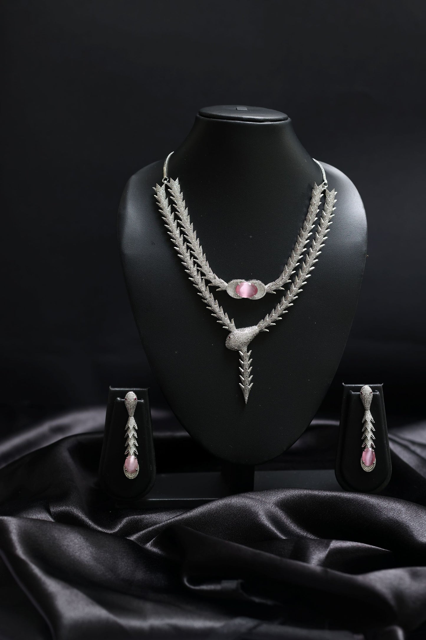 coiled glamourous pink ascent with stunning diamond necklace set