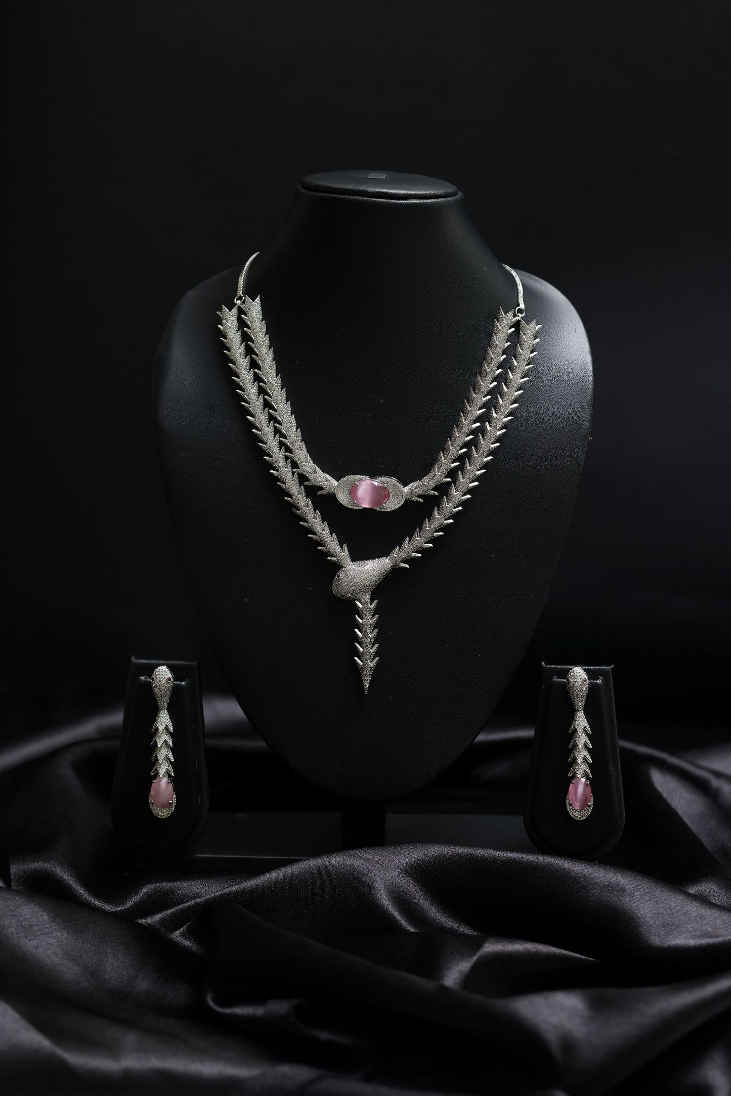 coiled glamourous pink ascent with stunning diamond necklace set