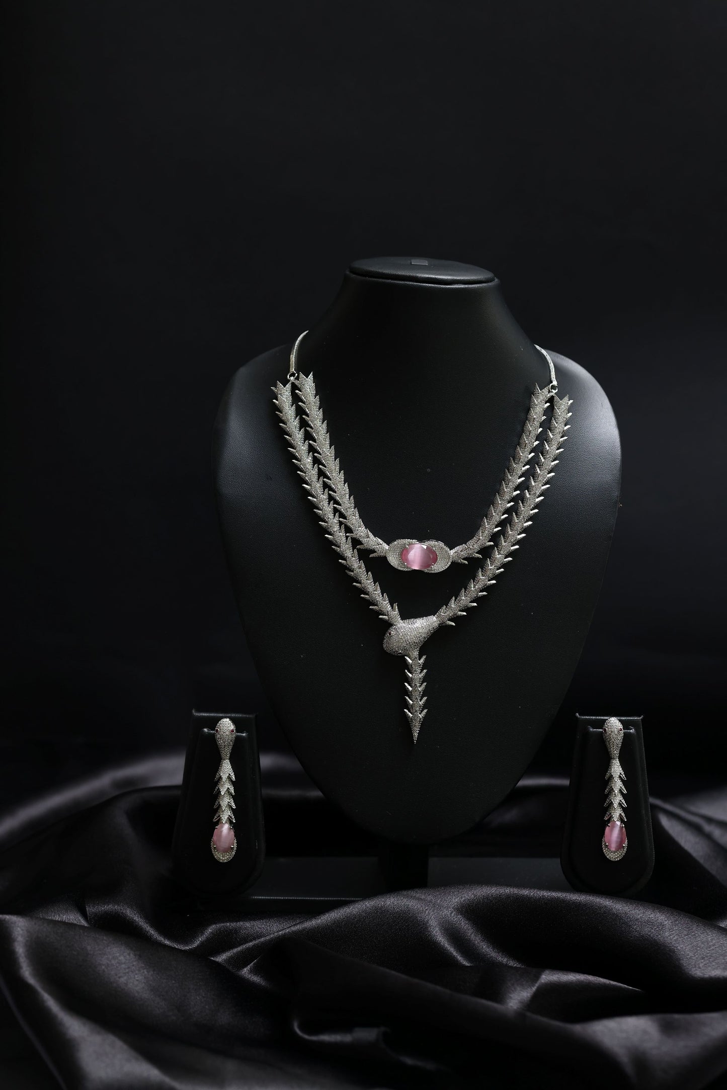 coiled glamourous pink ascent with stunning diamond necklace set